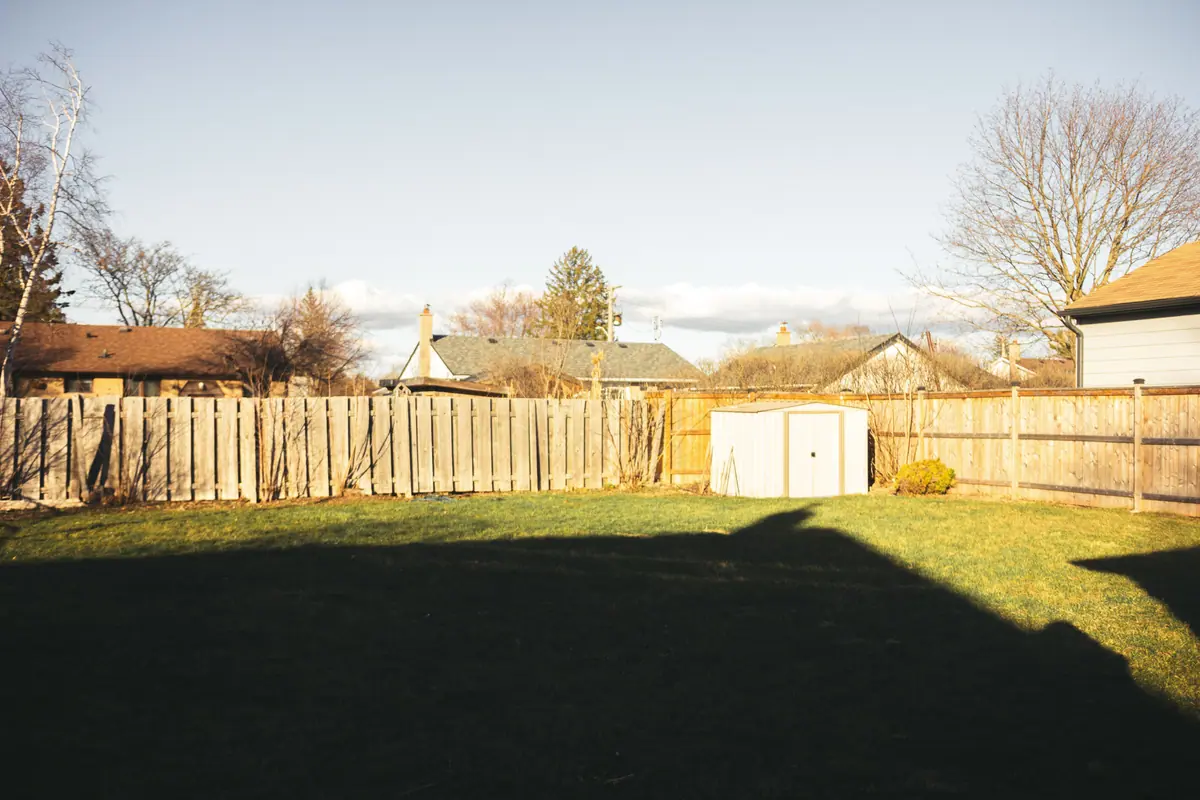Wood privacy fence around a residential back yard